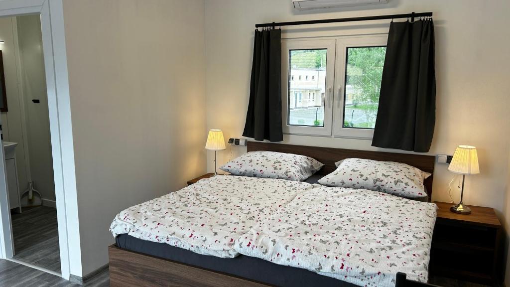 Postel nebo postele na pokoji v ubytování Apartmány Štramberk