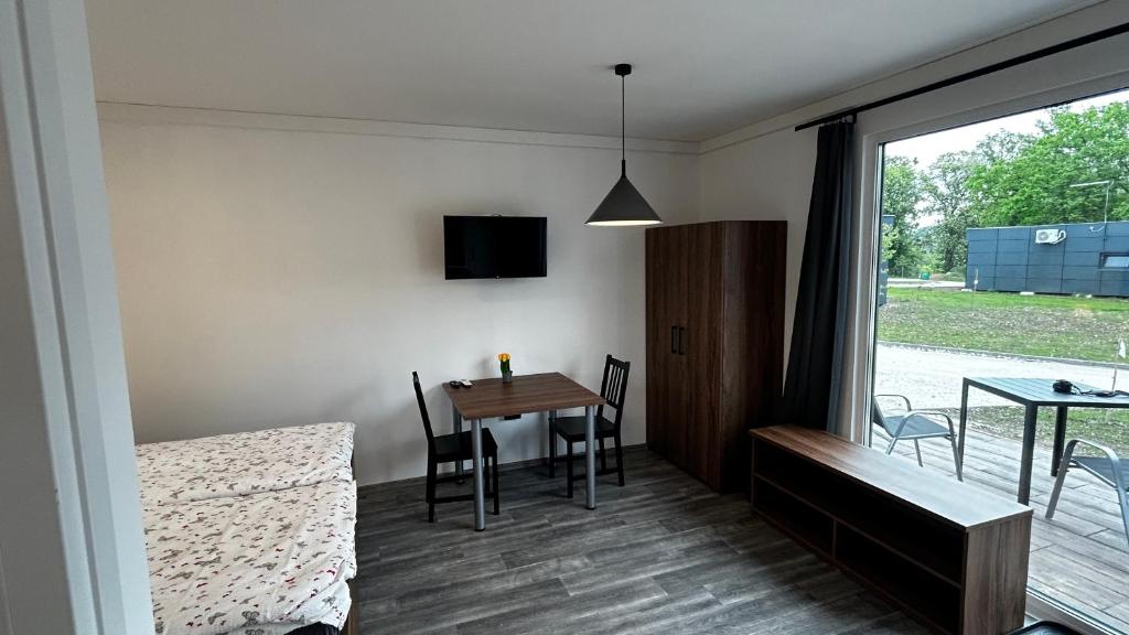 TV a/nebo společenská místnost v ubytování Apartmány Štramberk