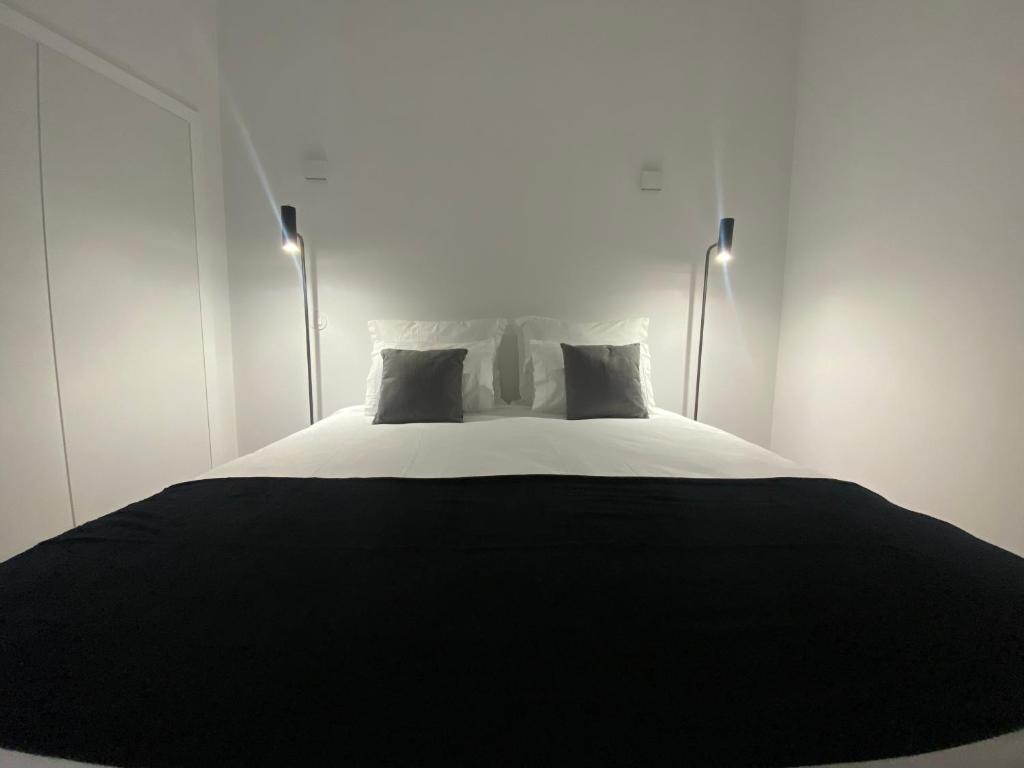 Postel nebo postele na pokoji v ubytování CASA de FORO - Apartamentos Turísticos