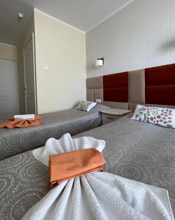 Postel nebo postele na pokoji v ubytování Damroka