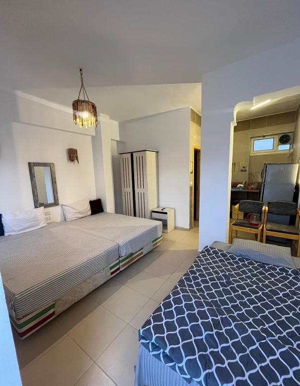 Postel nebo postele na pokoji v ubytování Sky Dahab Hotel