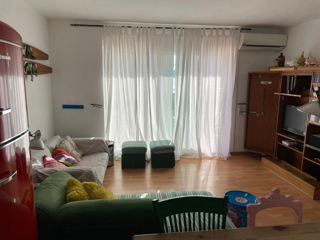 Posedenie v ubytovaní Apartamento RITS Beachfront
