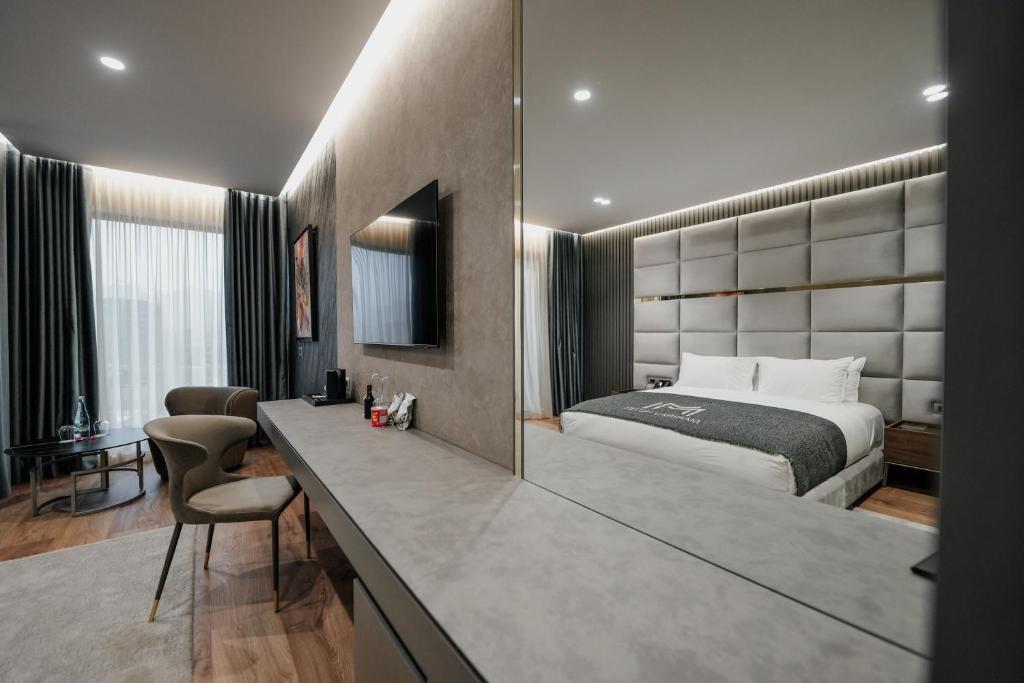 Postel nebo postele na pokoji v ubytování Marinaj Hotel & SPA