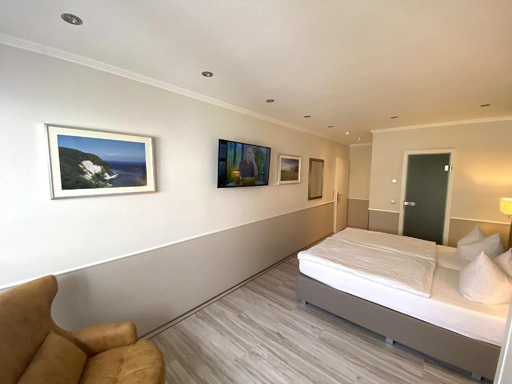 Postel nebo postele na pokoji v ubytování Hotel zum Hafen