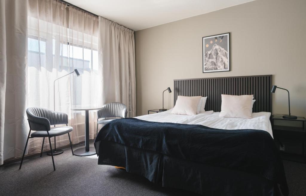 Cama o camas de una habitación en VICI HOTELS Linköping - Hotell Stångå