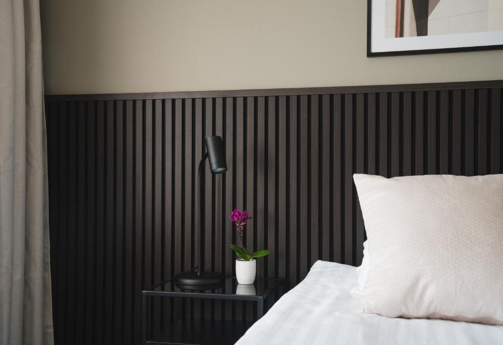 Postel nebo postele na pokoji v ubytování VICI Hotels Linköping