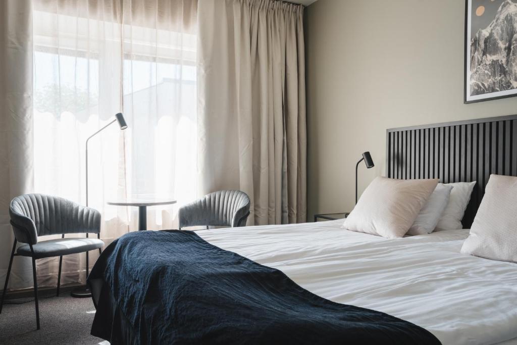Postel nebo postele na pokoji v ubytování VICI Hotels Linköping