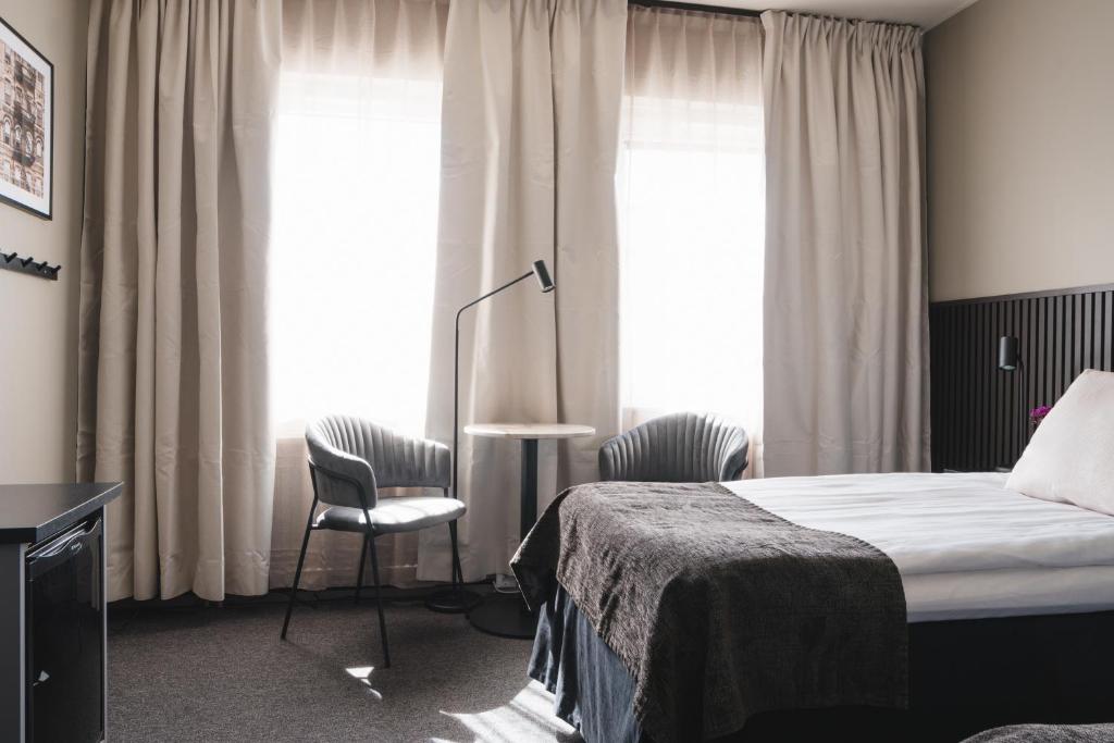 Postel nebo postele na pokoji v ubytování VICI Hotels Linköping