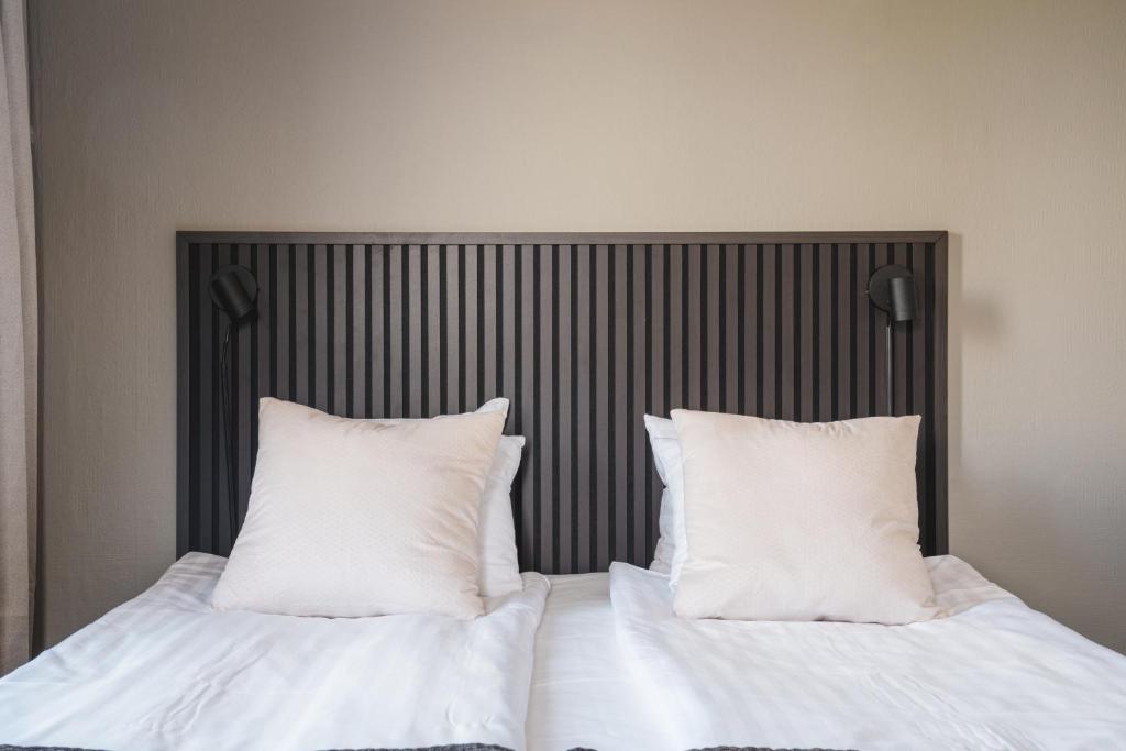 Postel nebo postele na pokoji v ubytování VICI Hotels Linköping