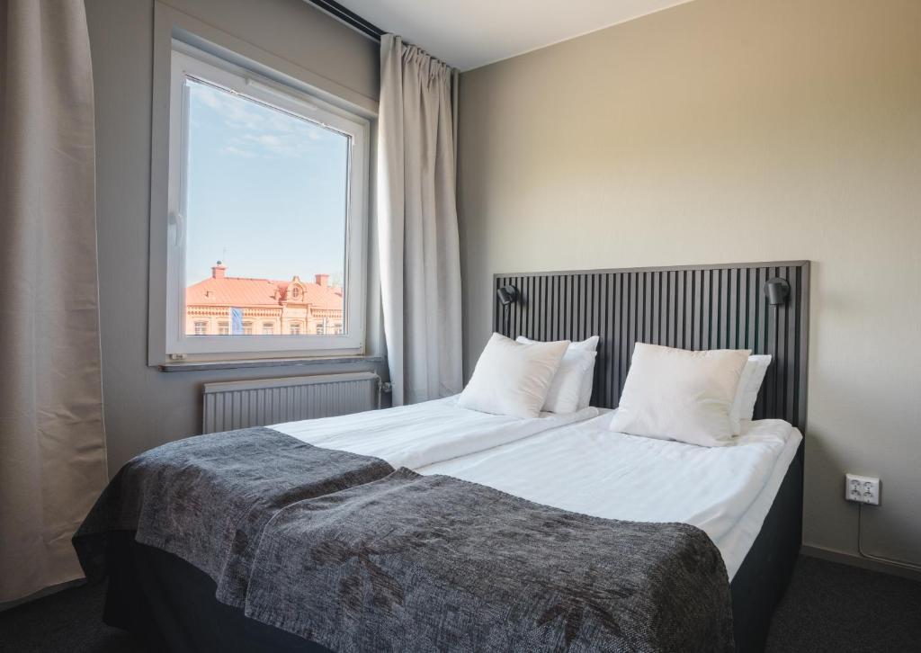 Postel nebo postele na pokoji v ubytování VICI Hotels Linköping