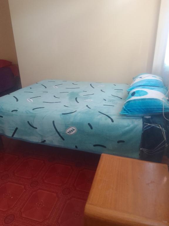 Postel nebo postele na pokoji v ubytování killa andina inn
