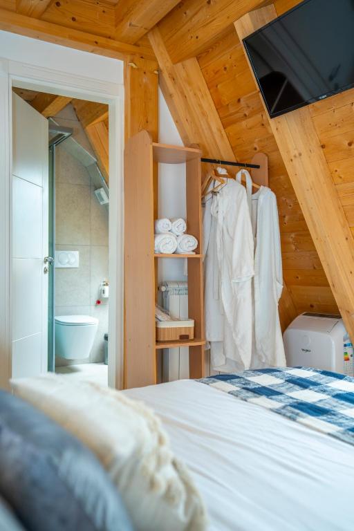 Postel nebo postele na pokoji v ubytování Vidis Chalet Boutique Hotel