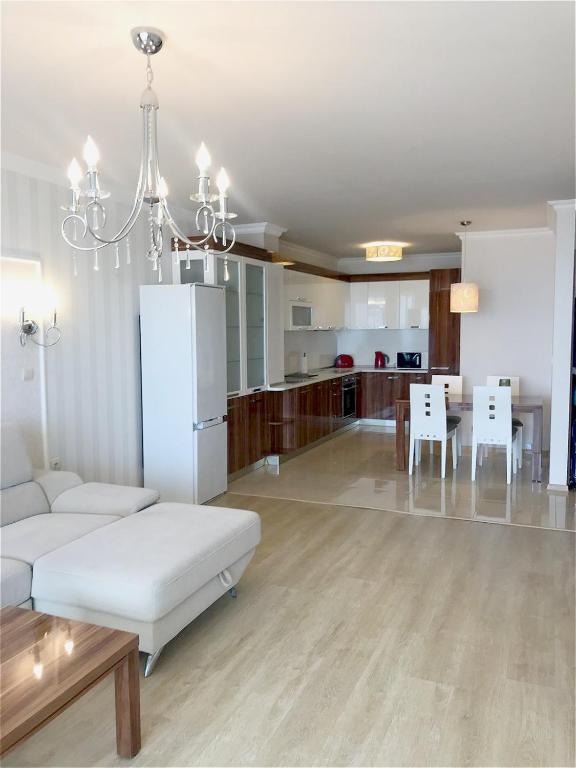 A kitchen or kitchenette at Private Super apartments by sea in Apart Hotel !