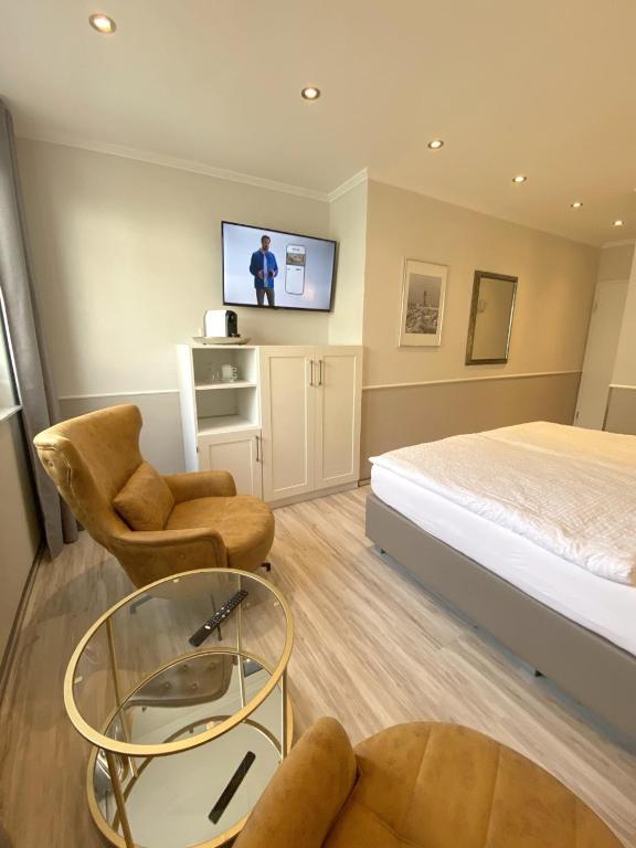 TV a/nebo společenská místnost v ubytování Hotel zum Hafen