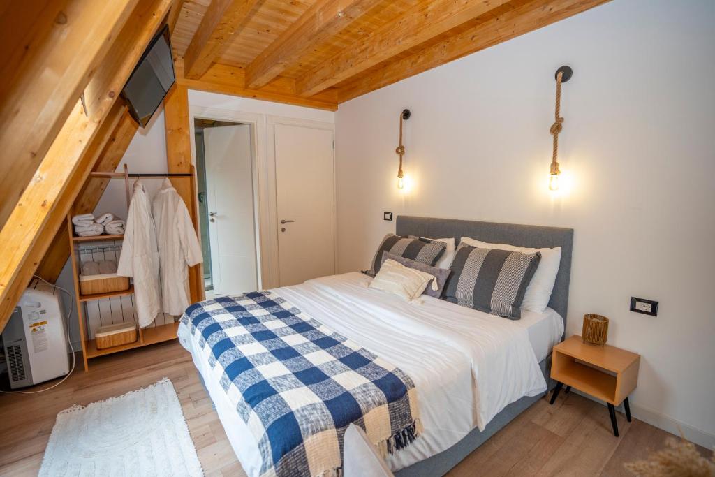 Postel nebo postele na pokoji v ubytování Vidis Chalet Boutique Hotel