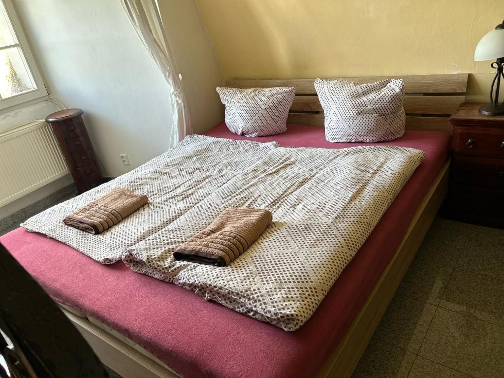 Postel nebo postele na pokoji v ubytování Rezidence Napoleon
