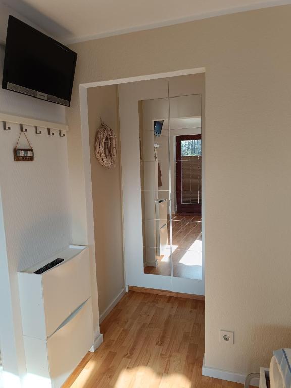 TV a/nebo společenská místnost v ubytování Appartement Plögemaker