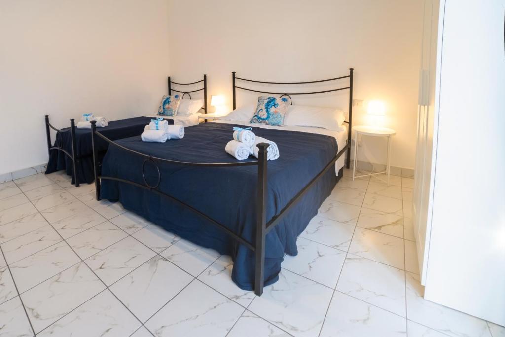 Posteľ alebo postele v izbe v ubytovaní Hippocampus B&B