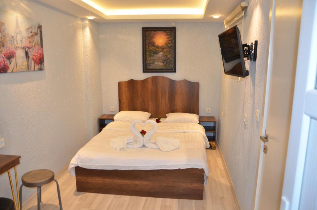 Voodi või voodid majutusasutuse İkbal Apart Hotel Old Town toas