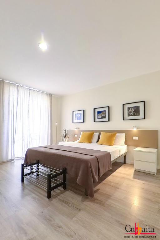 Postel nebo postele na pokoji v ubytování B&B Cubbaita