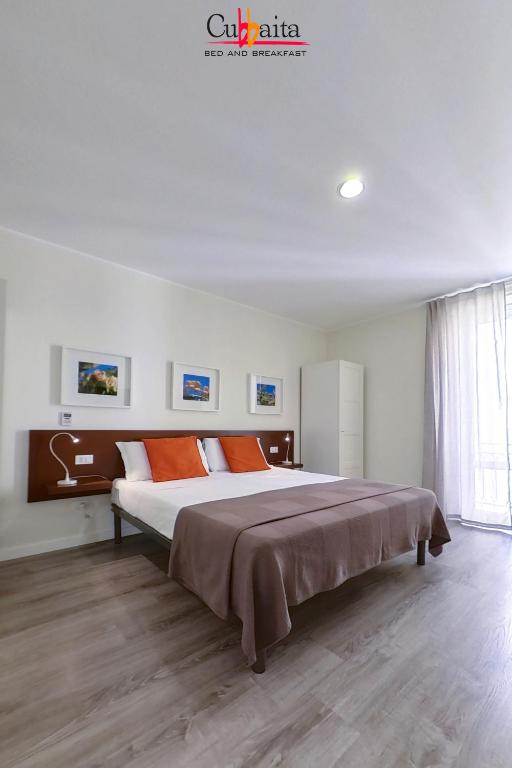 Postel nebo postele na pokoji v ubytování B&B Cubbaita