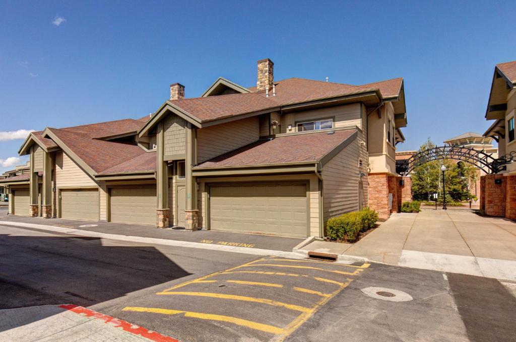 a house with a brown roof on a street at Foxpoint 1684-H3 by Moose Management in Park City