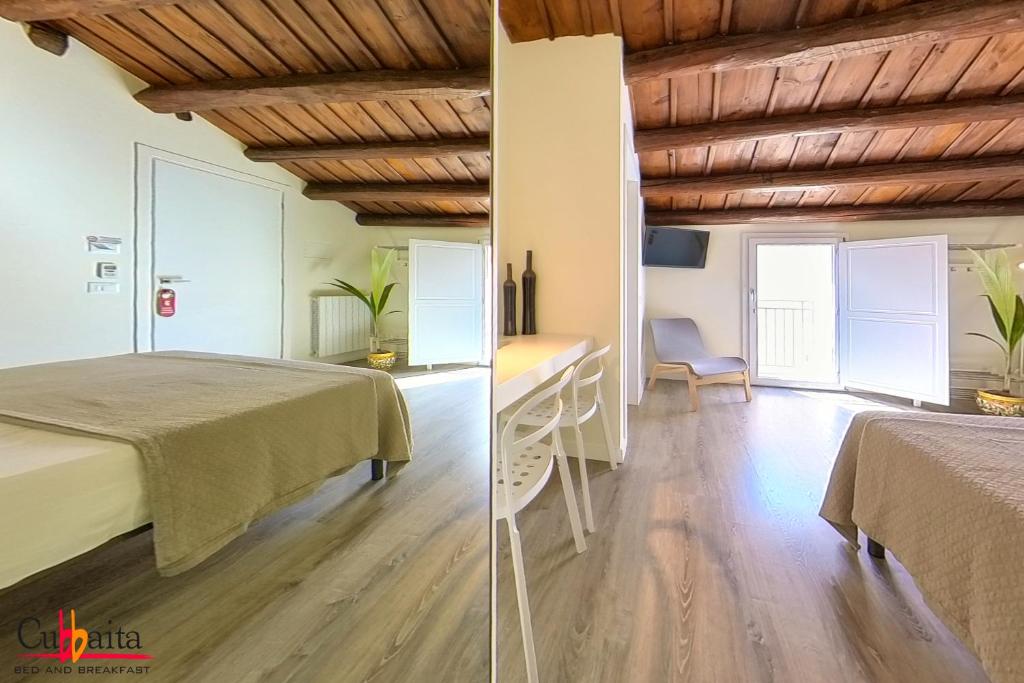 Postel nebo postele na pokoji v ubytování B&B Cubbaita