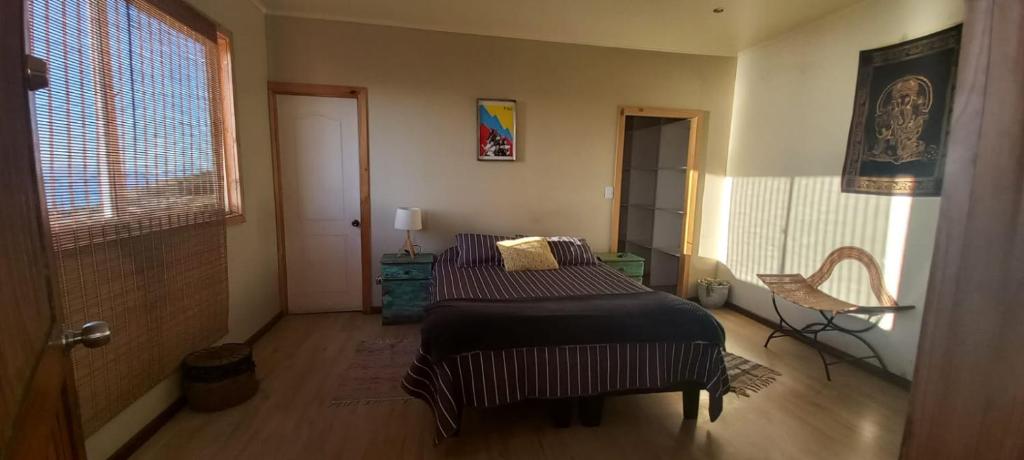 Katil atau katil-katil dalam bilik di Hostal El Faro