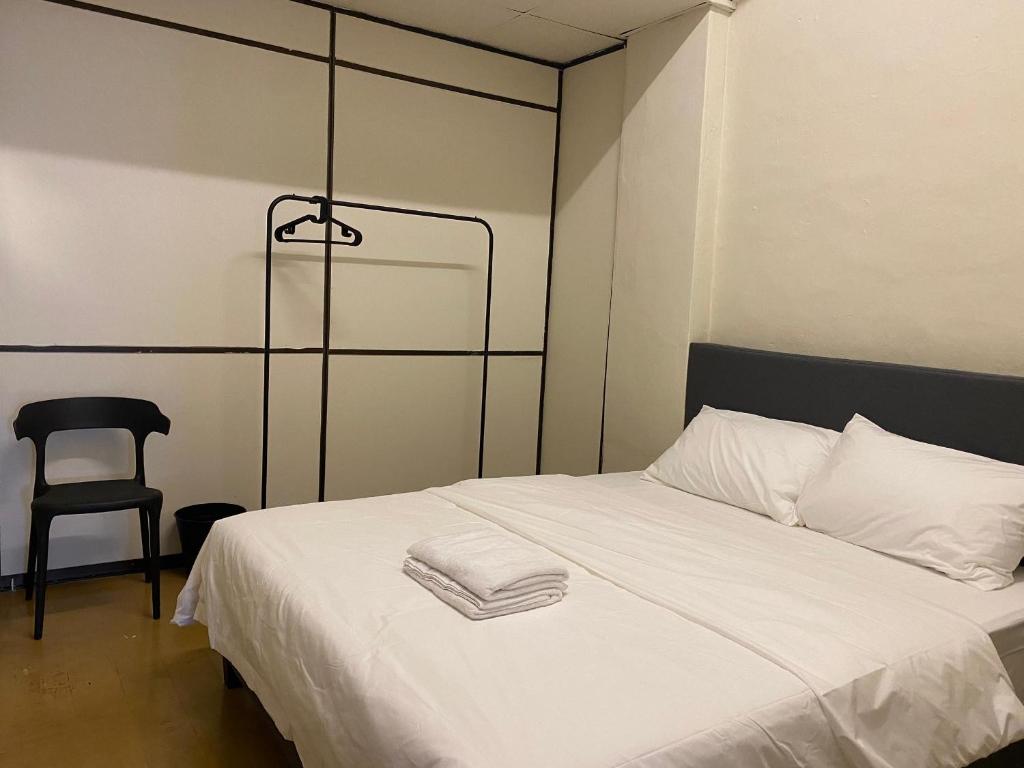 Postel nebo postele na pokoji v ubytování Aayu Beach St George Town Penang
