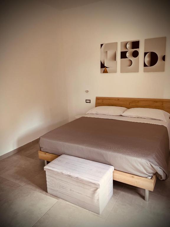 Postel nebo postele na pokoji v ubytování Maquini