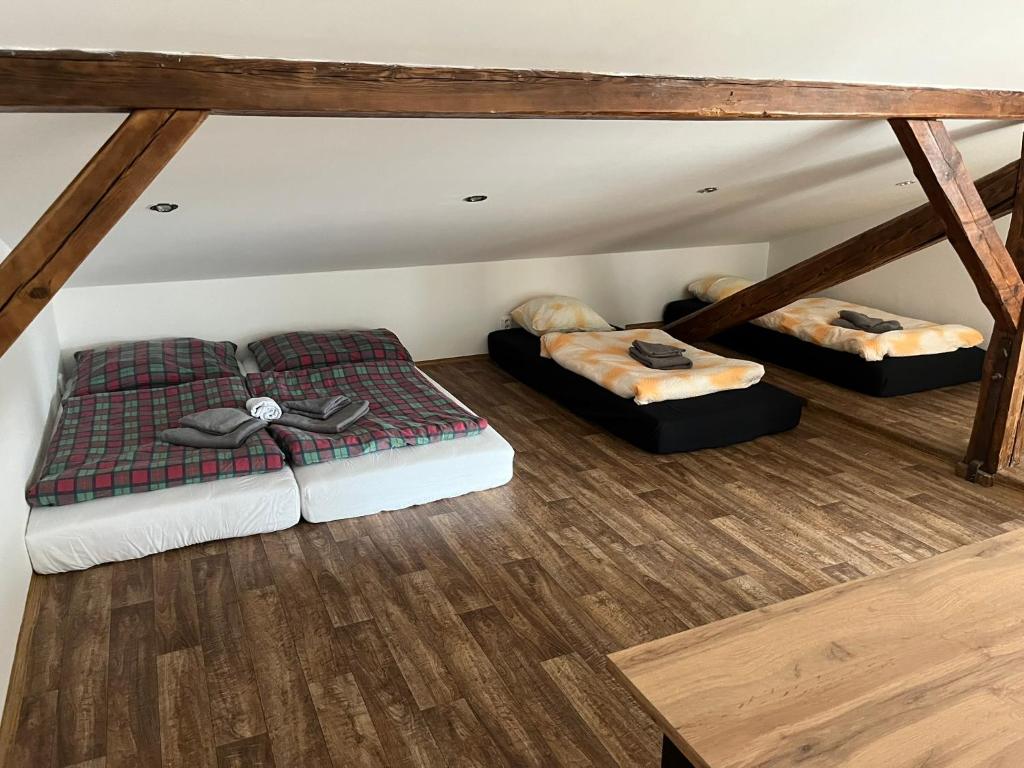 Postel nebo postele na pokoji v ubytování Apartmány Bowling Frýdlant
