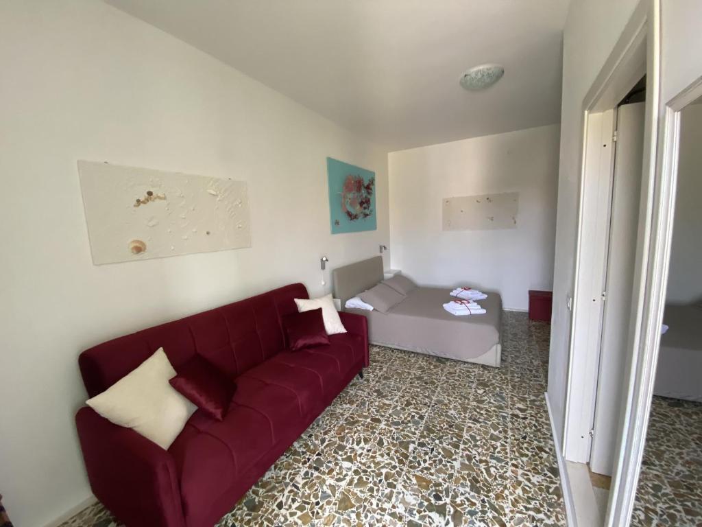 Posezení v ubytování Rossocorallo Rooms