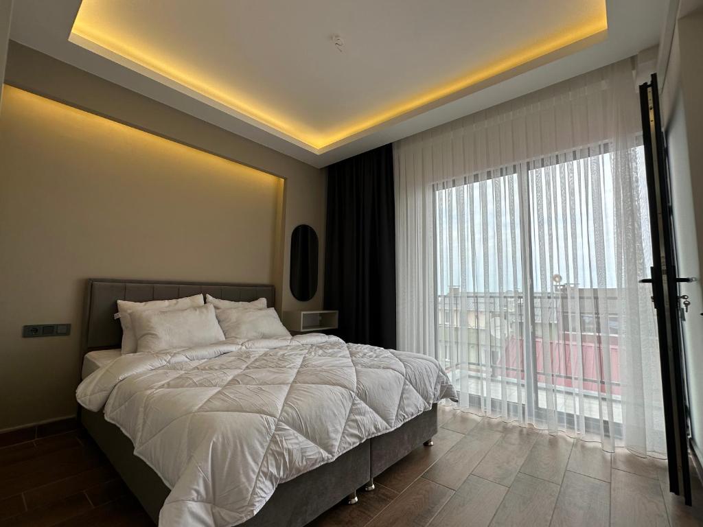 Postel nebo postele na pokoji v ubytování Vista Living Apartments