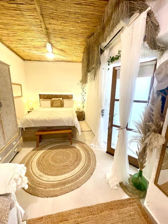Postel nebo postele na pokoji v ubytování Arcos de Tarifa, Casco historico