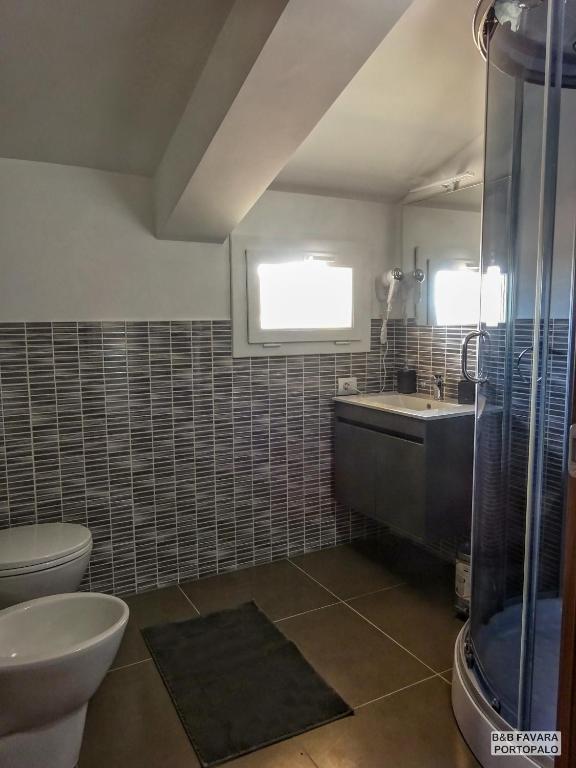 Koupelna v ubytování FAVARA Rooms