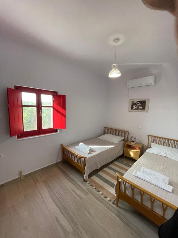 Postel nebo postele na pokoji v ubytování Sugar Stone House 2