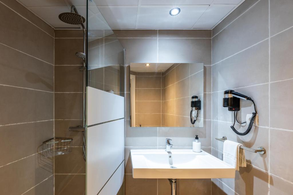 Koupelna v ubytování Hostal Alicante