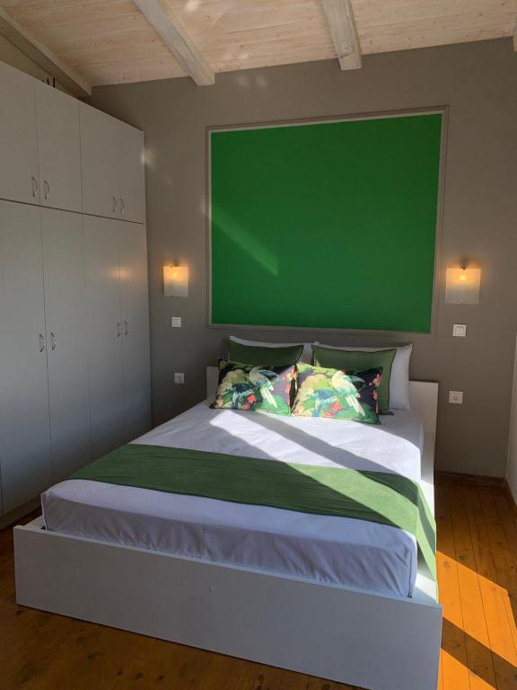 Postel nebo postele na pokoji v ubytování Olive Guest Farm