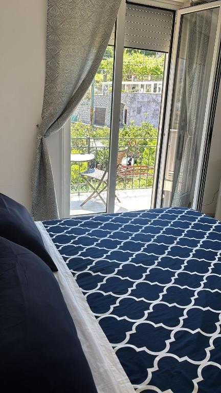 Postel nebo postele na pokoji v ubytování casa Ricciulella