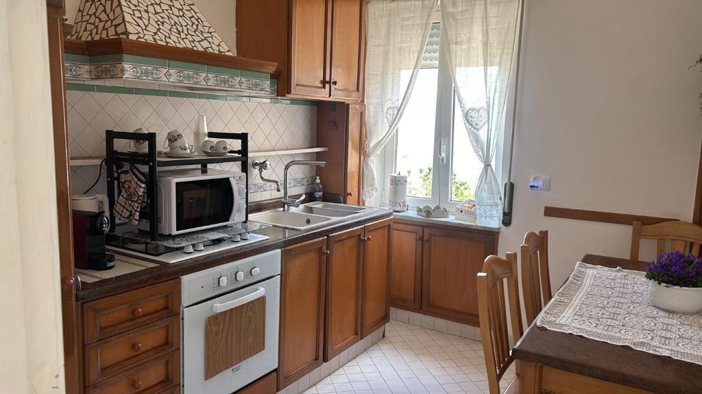 Kuchyň nebo kuchyňský kout v ubytování casa Ricciulella