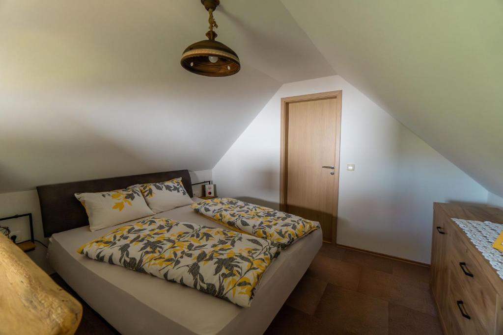 Postel nebo postele na pokoji v ubytování WeinSpitz - Wellness House