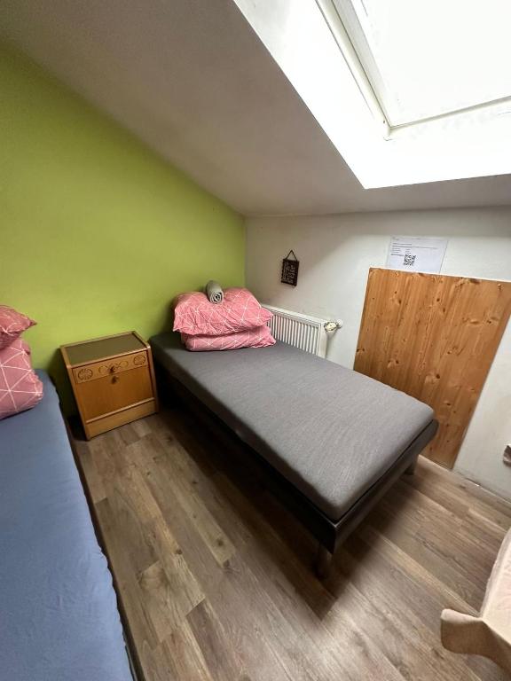 Postel nebo postele na pokoji v ubytování Pension Inntalhof