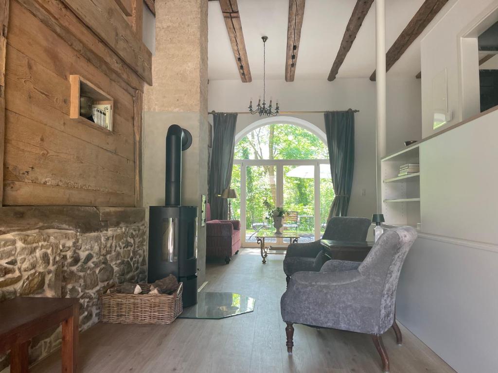 Χώρος καθιστικού στο Historische Mühle von Cramm, 6 Apartments