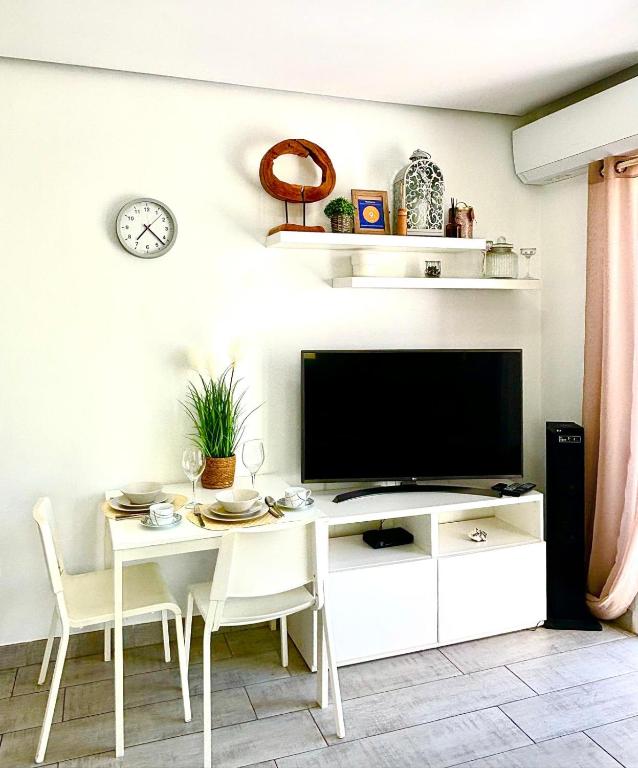 Televízia a/alebo spoločenská miestnosť v ubytovaní Orlando Luxury Costa Adeje