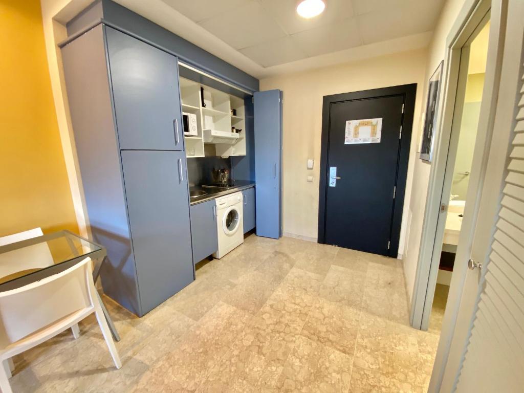 Kuchyň nebo kuchyňský kout v ubytování ApartHome®
