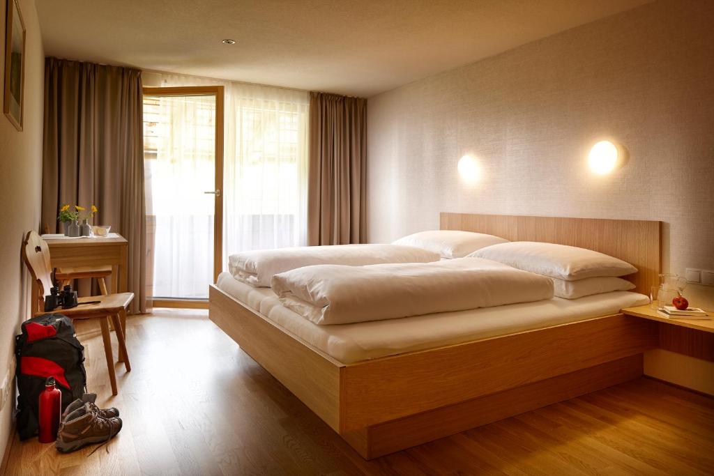 Postel nebo postele na pokoji v ubytování Haus Alpenrose