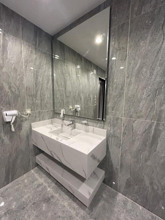 Koupelna v ubytování Elite House