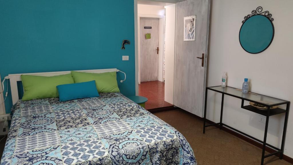 Postel nebo postele na pokoji v ubytování airone bianco bnb
