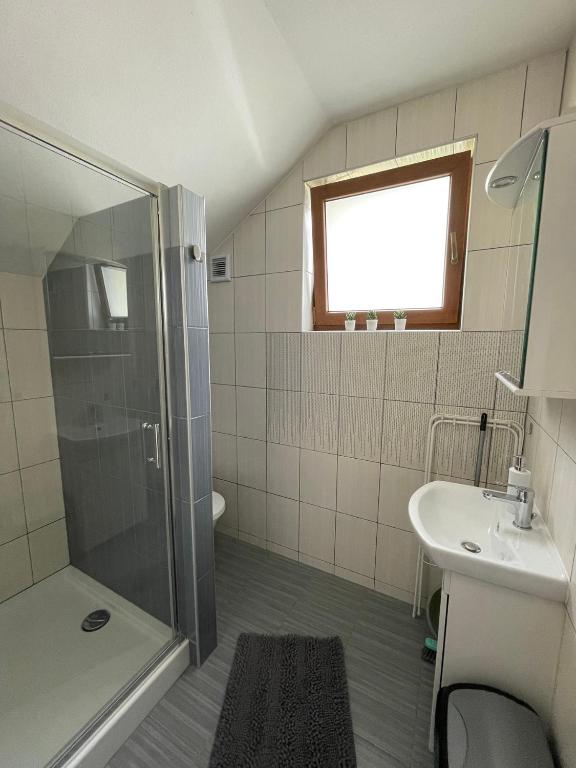 Kúpeľňa v ubytovaní Apartamenty ''Chcę Tu Zostać''
