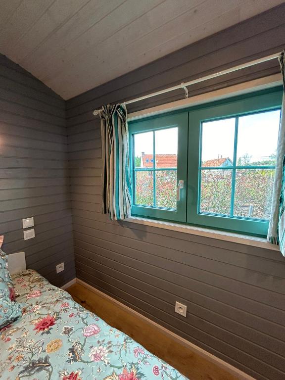Postel nebo postele na pokoji v ubytování La Bohème
